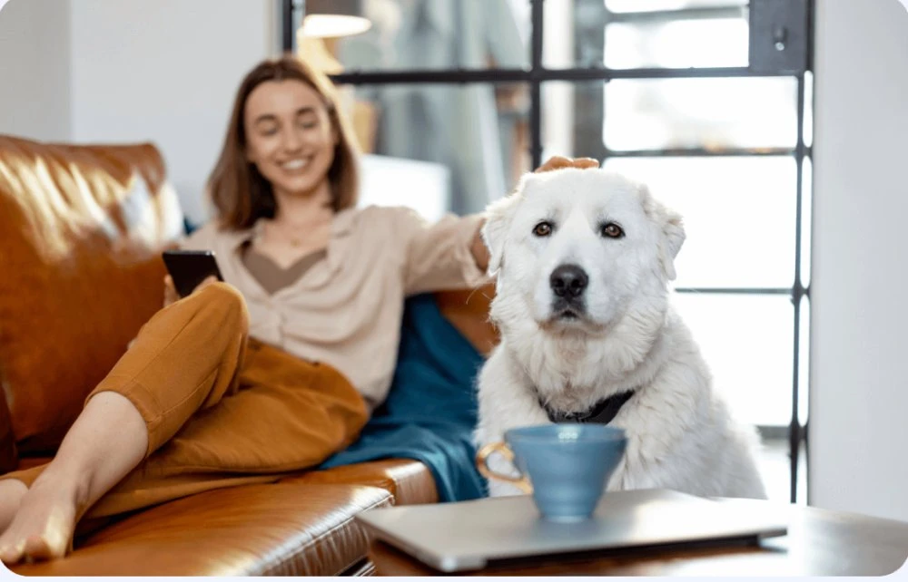 Owner relaxing with her dog